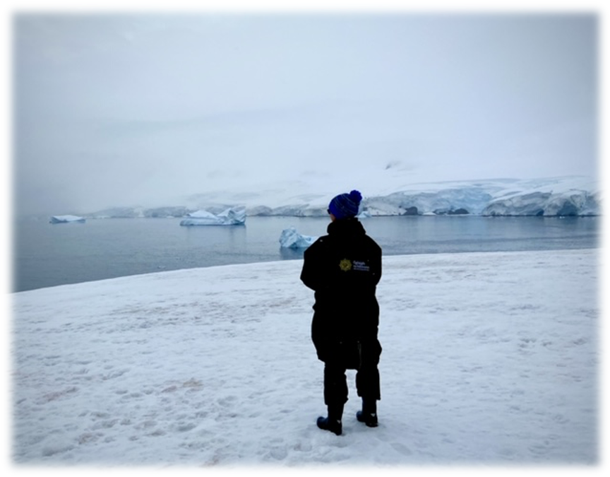 Dee Newell standing on Antarctica